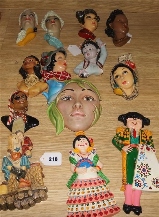 Ten Art Deco style plaster wall masks, various, etc.